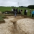 Area E, midway through excavation: Sheila explains the relationship between the linear ditches.